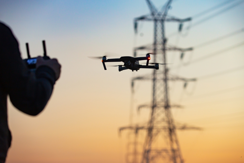 A person flying a drone